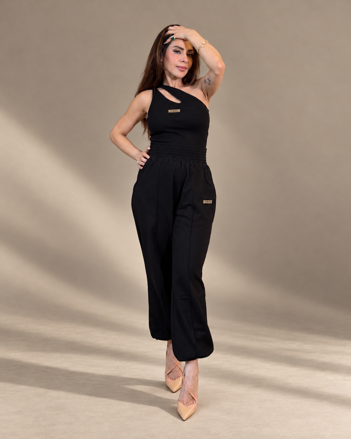 JUNNE Midnight Duo Co-ord Set — full-length studio pose wearing the black Kylie Top and Mila Joggers